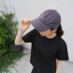 the model is wearing the cap
