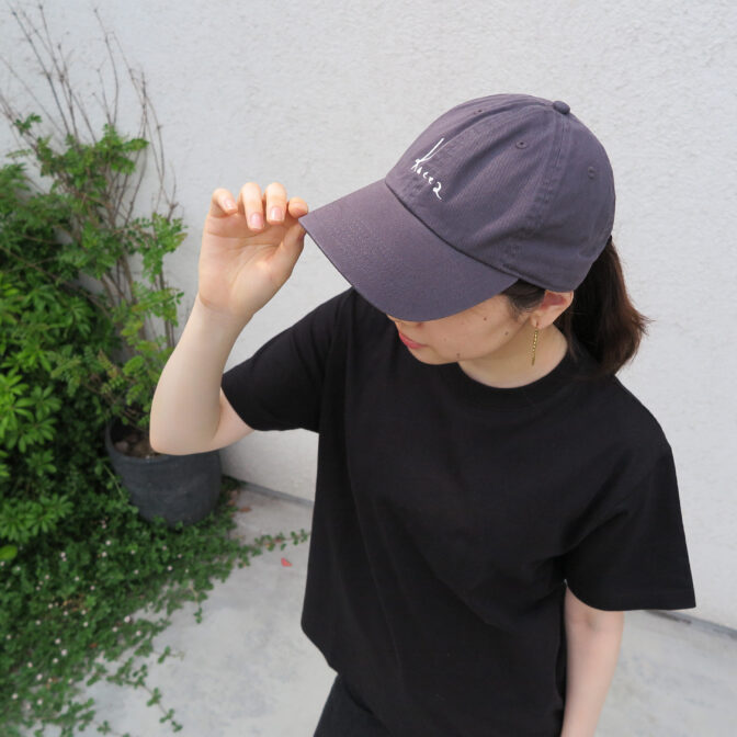 the model is wearing the cap