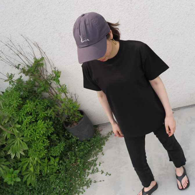 the model is wearing the cap