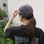 the model is wearing the cap