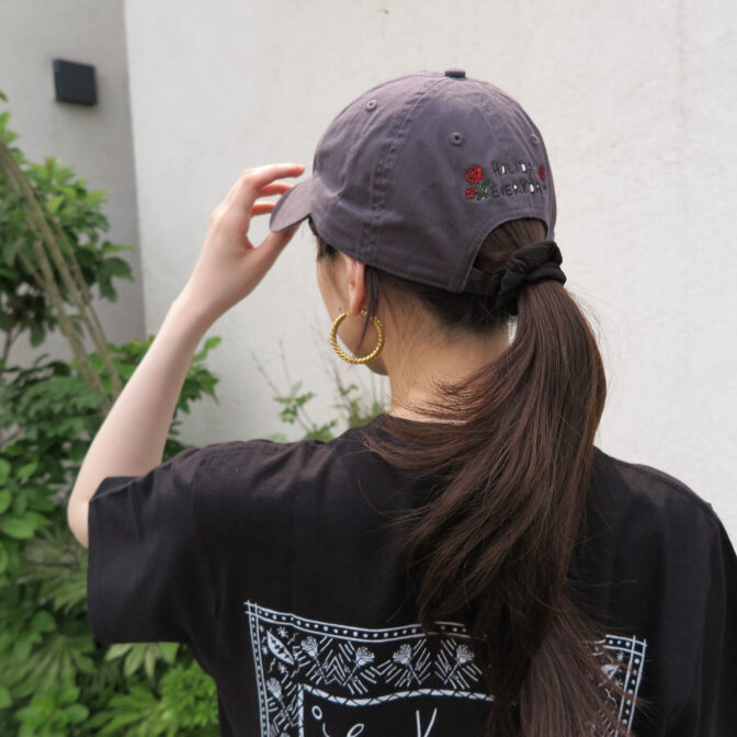 the model is wearing the cap