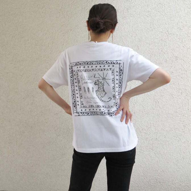 the model is wearing the white t-shirt