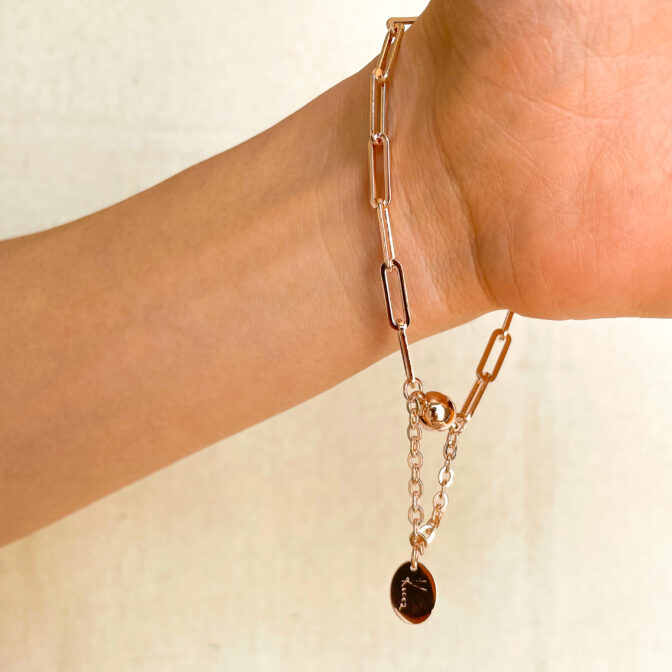a pink gold chain bracelet