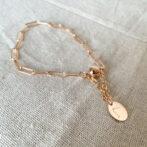 a pink gold chain bracelet