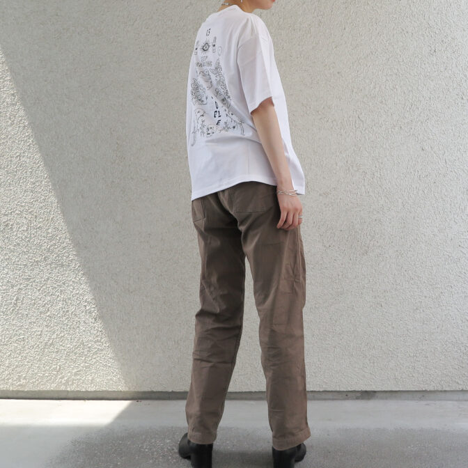 the model is wearing a white shirt